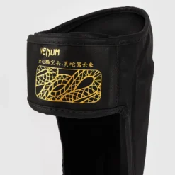 Venum Serpenti Shinguards Black/Silver/Gold