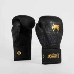 Venum X CHIMAEV Wild Borz Boxing Gloves Black/Gold, 10oz